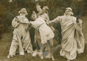 An image of a young girl being sacrificed by a group of Druids.  