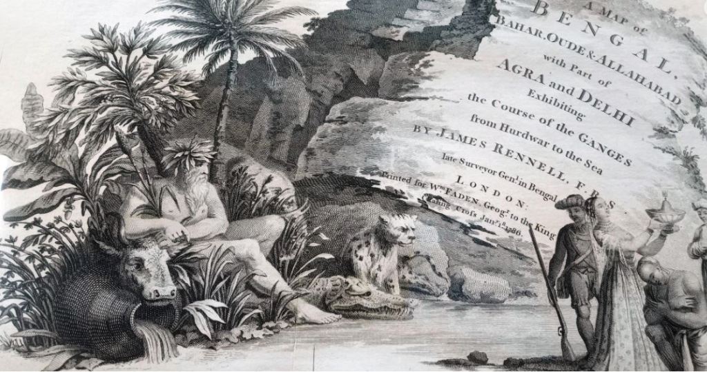 Detail from an engraved map with a mythical figure sitting in bushes with a cheetah, bulls head and crocodile. 4 figures stand to the right in clothes inspired by 19th century British ideas of Bengali clothing.