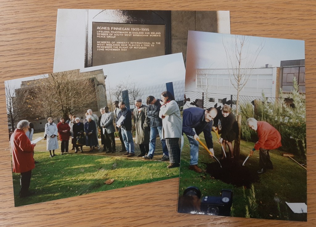 3 photographs from the Bournville Amnesty Group. relating to Agnes Finnegan. A group stands in an outdoor space listening to a person. A tree being planted by 3 people and a plaque commemorating her life.